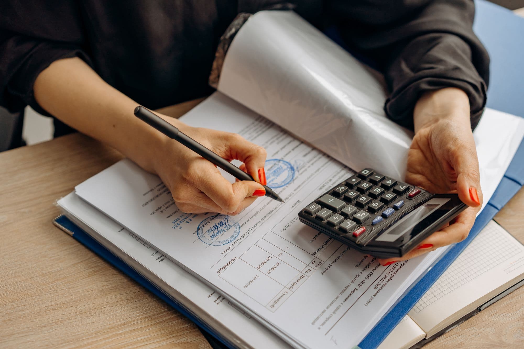 Accountant reviewing and signing prepared work